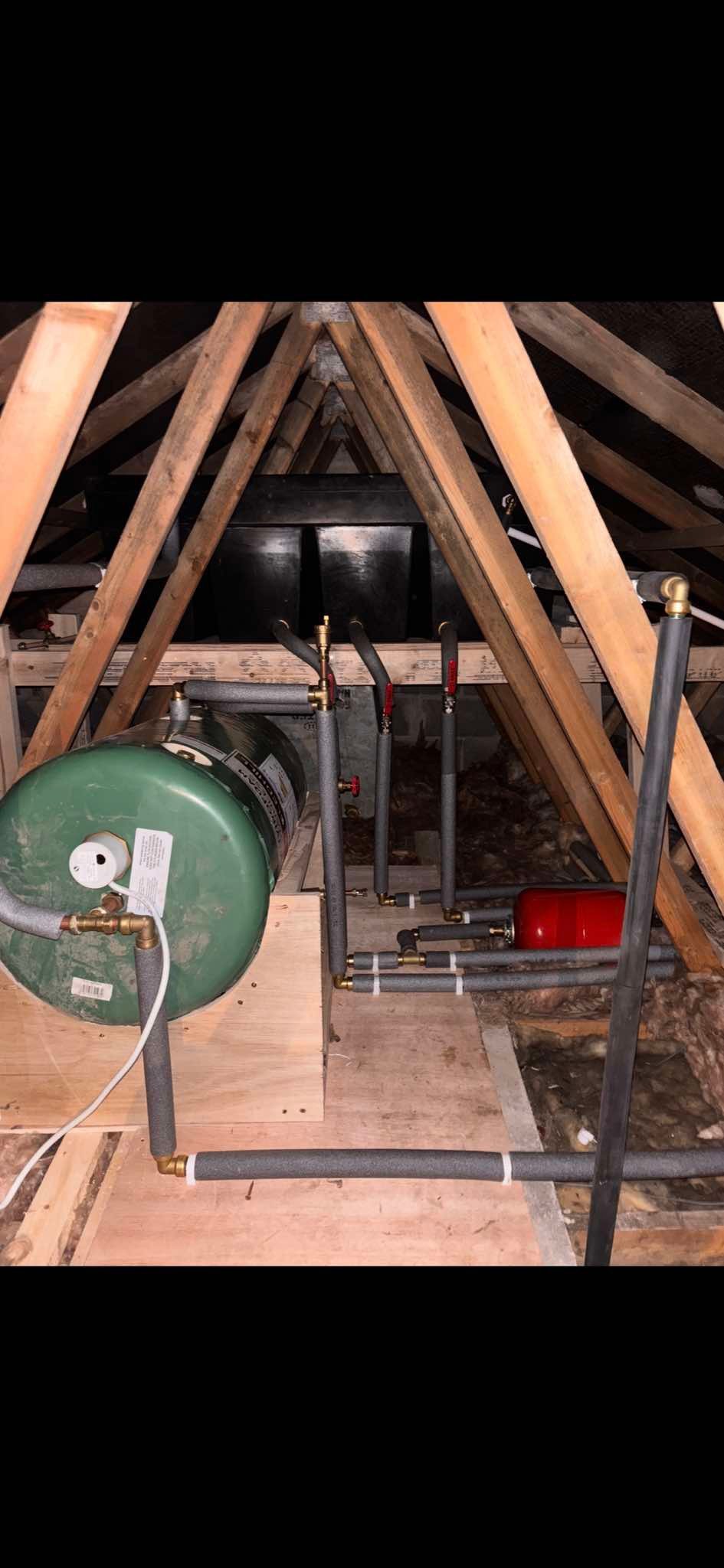 Neat pipework connections on hot water cylinder installation, The Pipe Guy Kildare
